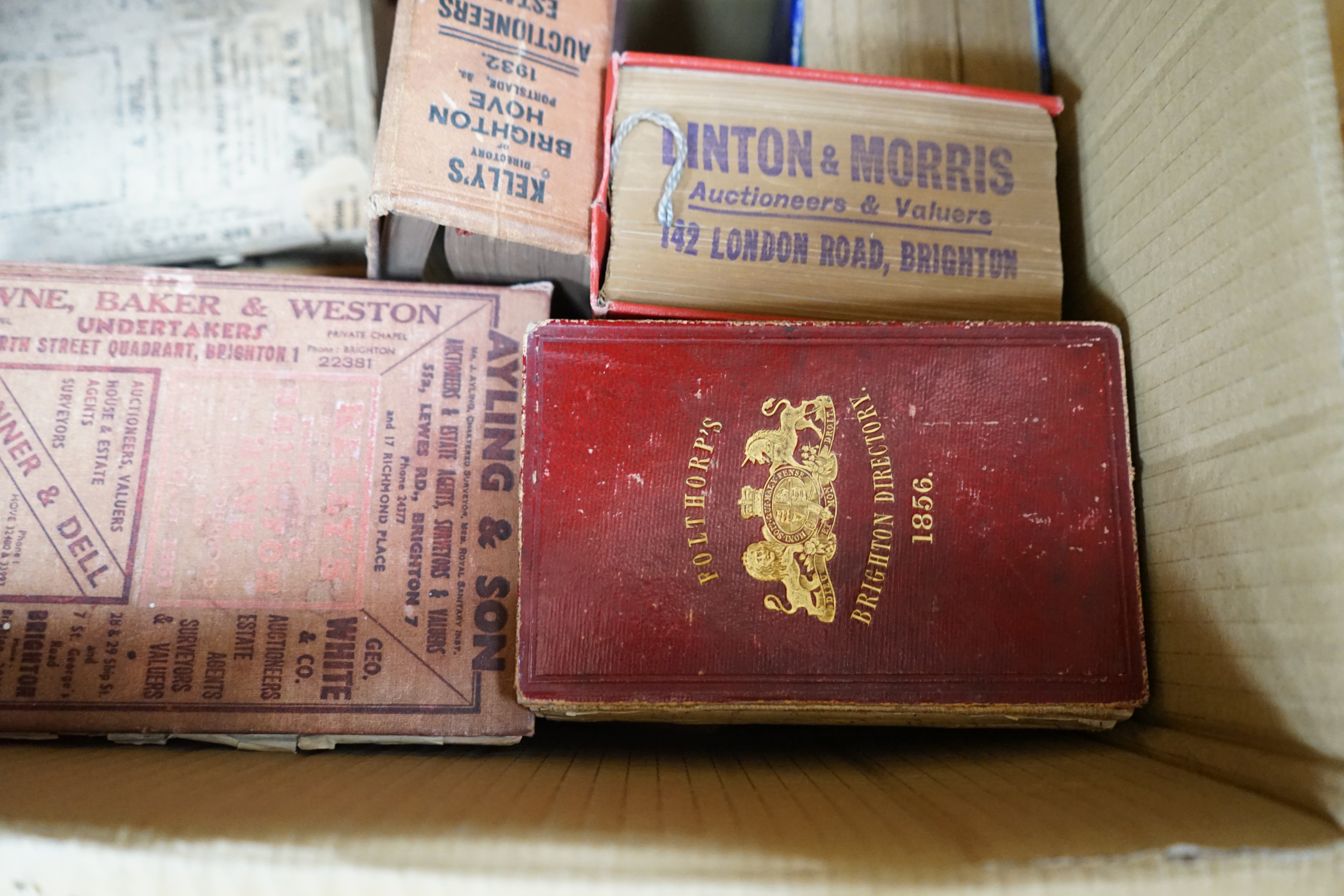 A collection of Brighton Directories, 1856 onwards (one box). Condition - poor to fair, some bindings loose and covers detached or faded